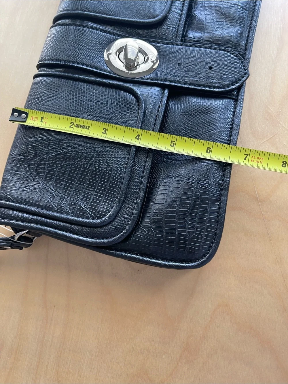 Cosmopolitan Black Leather Wristlet with Turn-Lock Accent